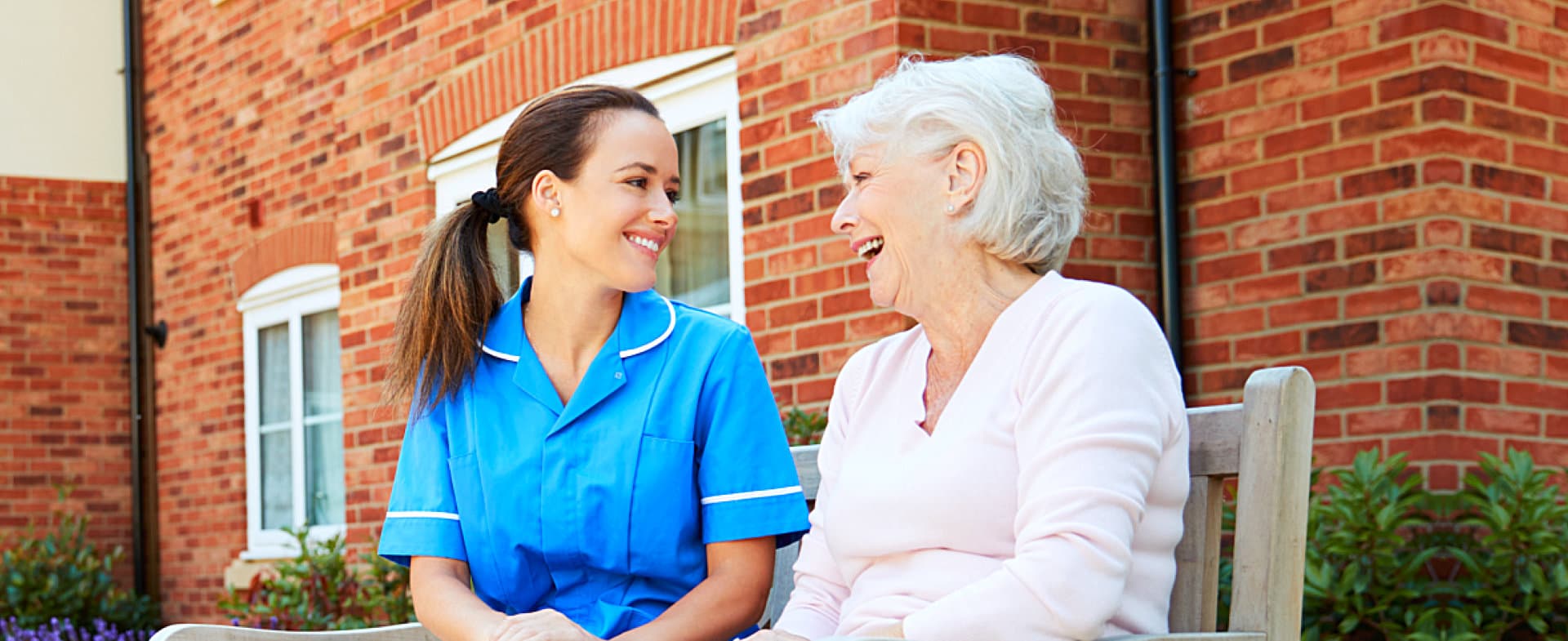 caregiver and her patient chatting